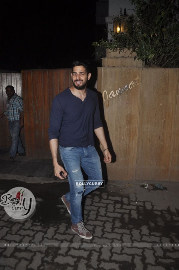 Sidharth Malhotra poses for the media at Shaad Randhawa's Party