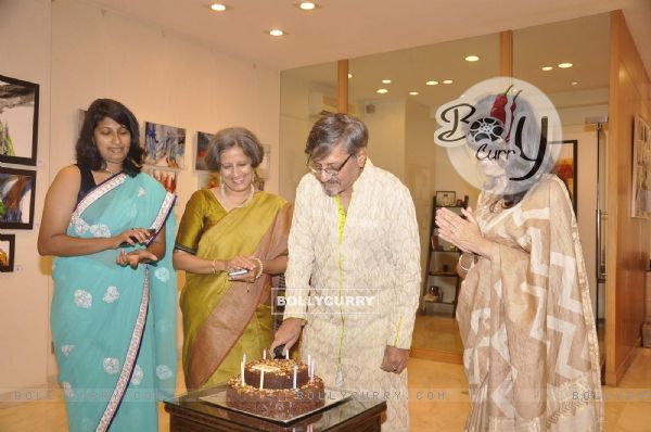 Amol Palekar cuts a cake at his Art Exhibition