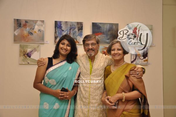 Amol Palekar poses with his wife and daughter at the Art Exhibition