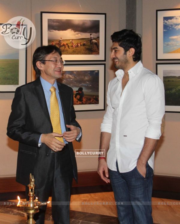 Mohit Marwah in conversation with a guest at Mongolia Day, An Art Exhibition by Shantanu Das