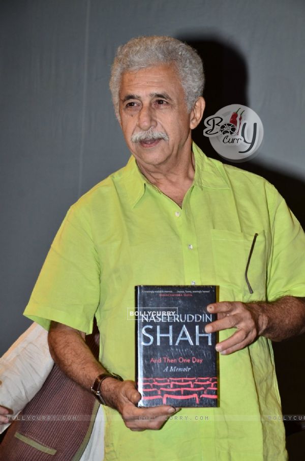 Naseeruddin Shah poses with his Book, 'And Then One Day' at the Launch