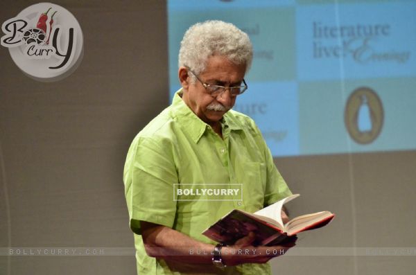 Naseeruddin Shah was snapped browsing through his book at the Launch