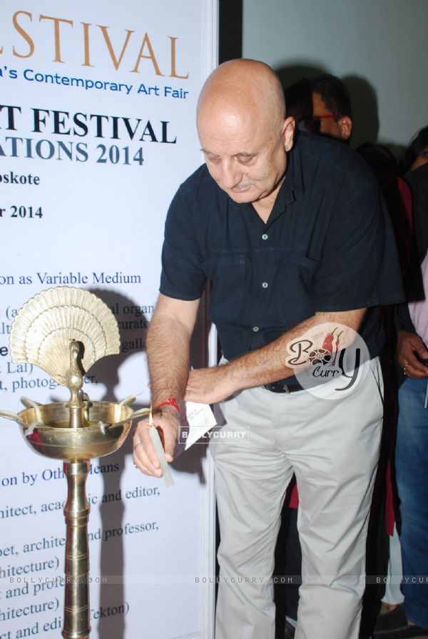 Anupam Kher lights the lamp at the Inauguration of India Art Festival