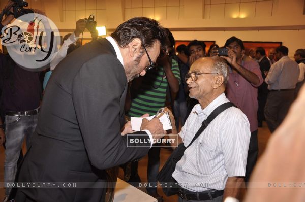Jackie Shroff signs autograph for a fan at Camel Colors Exhibition