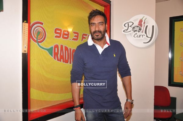 Ajay Devgn poses for the media at the Promotions of Action Jackson at Radio Mirchi (347024)