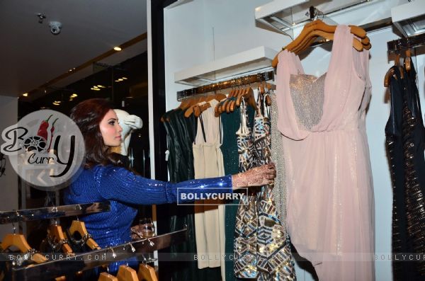 Daisy Shah checks out the designs at the bebe Store