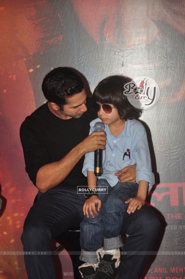 Varun Dhawan interacts with a young fan at the Trailer Launch of Badlapur