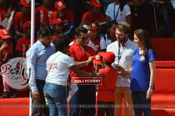 Salman Khan autographs a cap at the Launch of '#grassroots football movement'