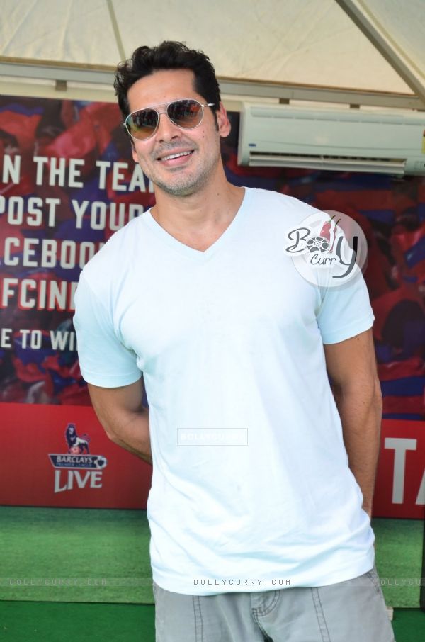 Dino Morea poses for the media at Barclays Premier League