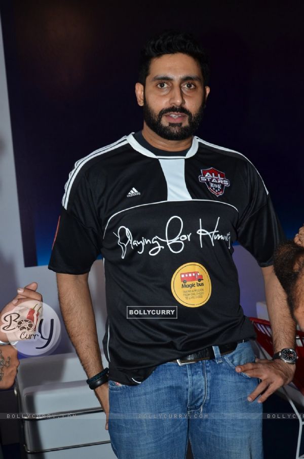 Abhishek Bachchan poses for the media at Barclays Premier League