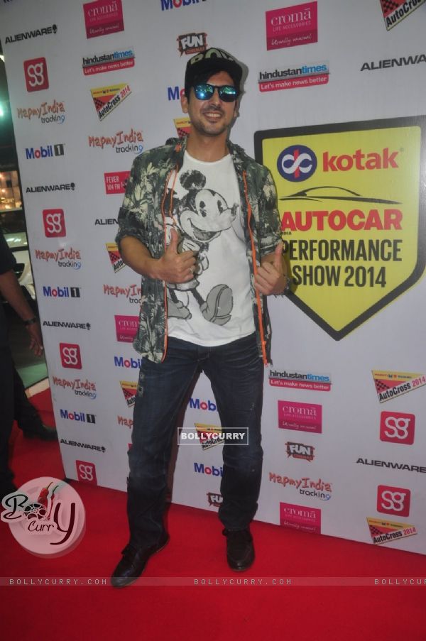 Zayed Khan poses for the media at Autocar Show