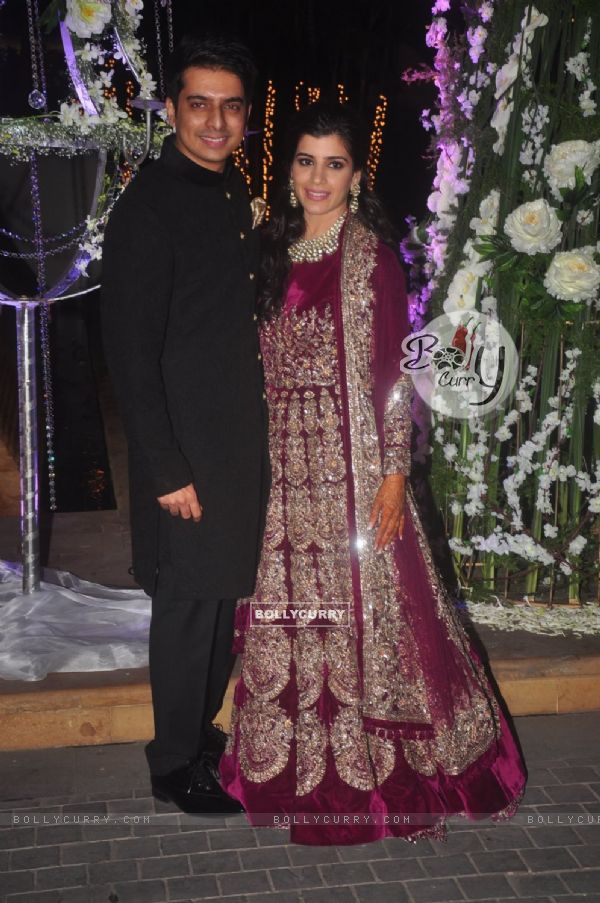 Riddhi Malhotra and Tejas Talwalkar pose for the media at their Sangeet Ceremony