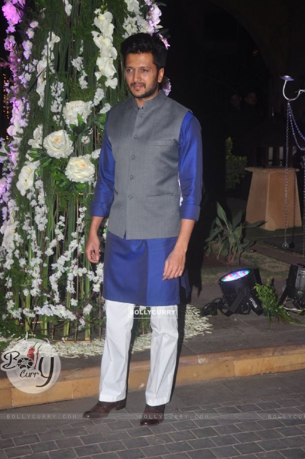 Riteish Deshmukh poses for the media at the Sangeet Ceremony of Riddhi Malhotra and Tejas Talwalkar