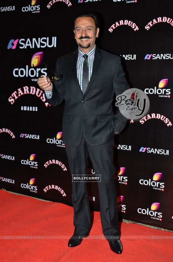 Gulshan Grover poses for the media at Sansui Stardust Awards Red Carpet