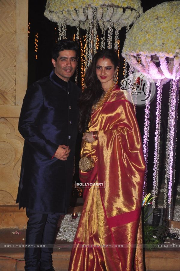 Manish Malhotra poses with Rekha at the Wedding Reception of Riddhi Malhotra and Tejas Talwalkar