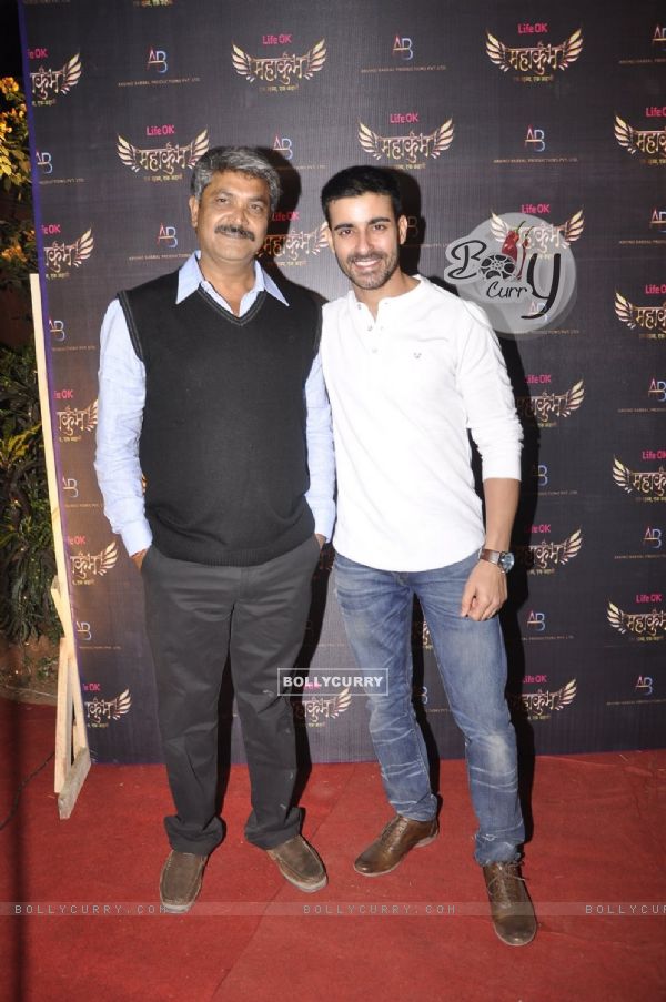 Gautam Rode poses with a friend at the Launch of Mahakumbh