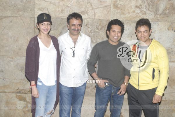 Team of P.K. poses with Sachin Tendulkar at the Special Screening