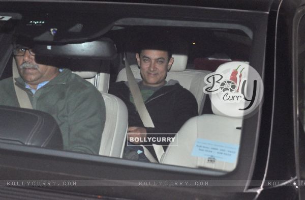 Aamir Khan smiles for the camera at the Special Screening of P.K. at Ambani's Residence