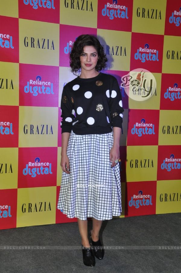 Priyanka Chopra poses for the media at the Launch of Grazia's New Issue