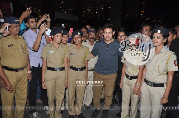 Aamir Khan poses with the Police Officials at the Special Screening of P.K. for the Cast and Crew