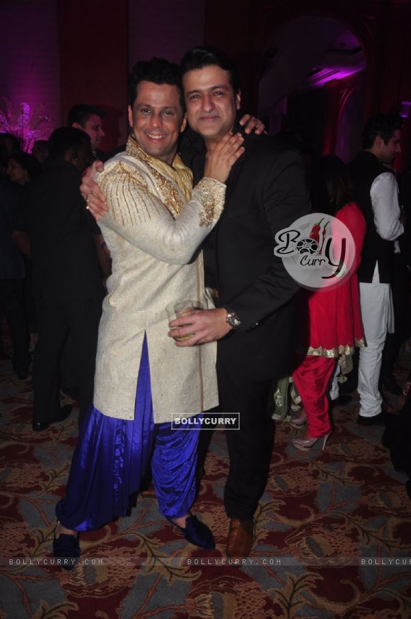 Armaan Kohli poses with a friend at Uday and Shirin's Sangeet Ceremony