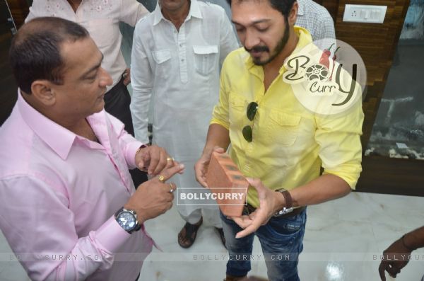 Shreyas Talpade checks out the bricks at the Launch of Building Bricks