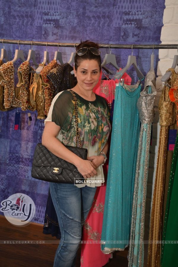 Neelam Kothari poses for the media at Seema Khan's Christmas Collection Launch