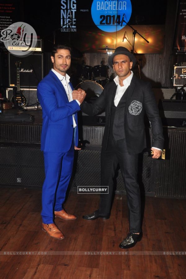 Vidyut Jamwal and Ranveer Singh pose for the media at FHM Bachelor of the Year Bash