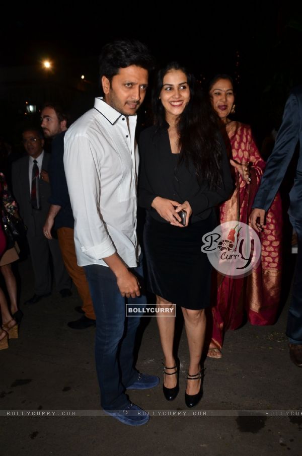 Riteish and Genelia pose for the media at Midnight Mass