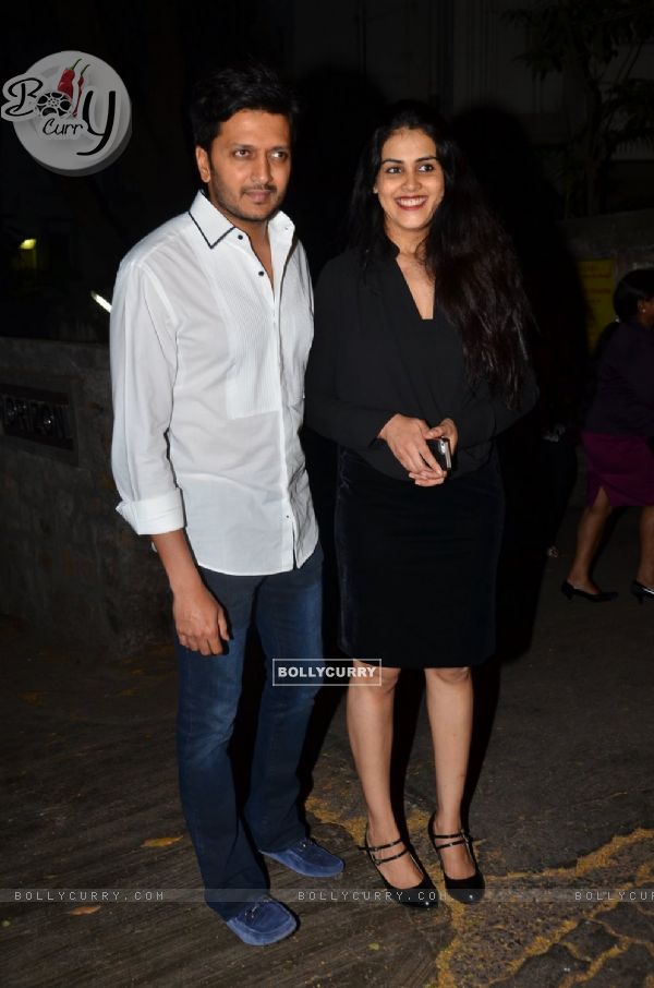 Riteish and Genelia pose for the media at Midnight Mass