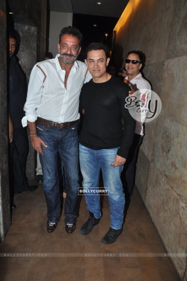Aamir Khan and Sanjay Dutt pose for the media at the Special Screening of P.K. (350144)
