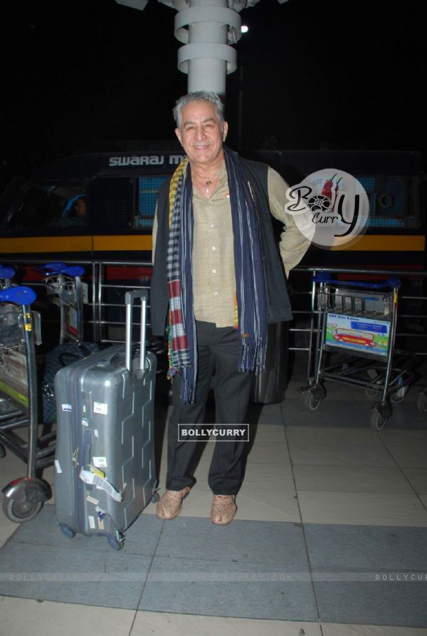 Dalip Tahil poses for the media at Airport