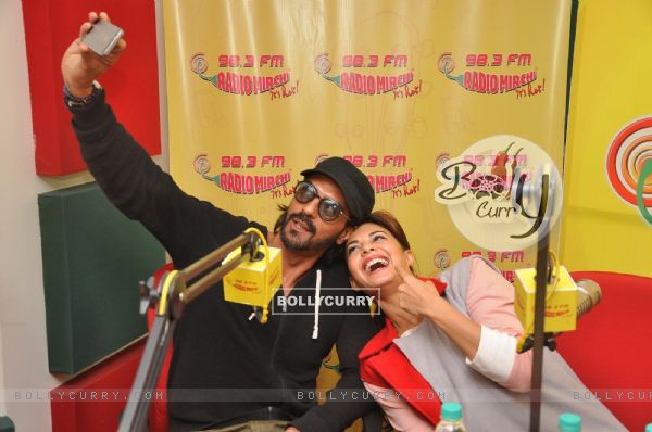 Arjun Rampal clicks a selfie with Jacqueline Fernandes at the Promotions of Roy on 98.3 Radio Mirchi