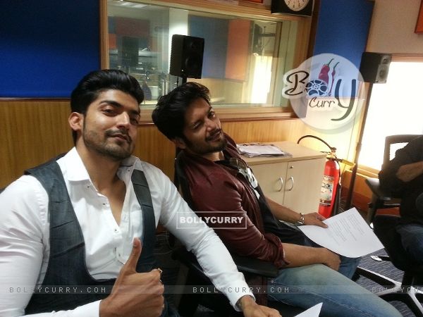 Gurmeet Choudhary and Ali Fazal pose during the Promotions of Khamoshiyan on Radio City 91.1 FM