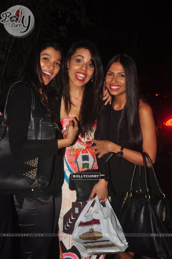 Candice Pinto poses with friends Outside Olive