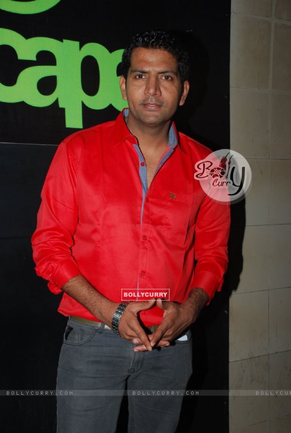 Ashutosh Kaushik poses for the media at Kamaal Rashid Khan's Birthday Bash