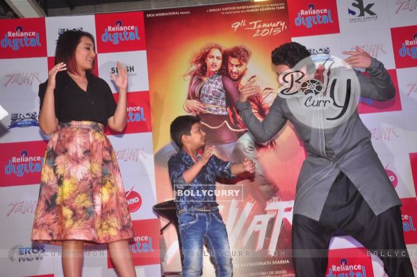 Arjun Kapoor and Sonakshi Sinha shake a leg with a young fan at the Promotions of Tevar