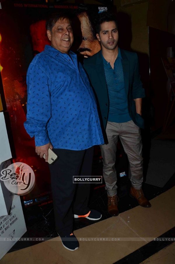 Varun Dhawan poses with father David Dhawan at the Song Launch of Badlapur