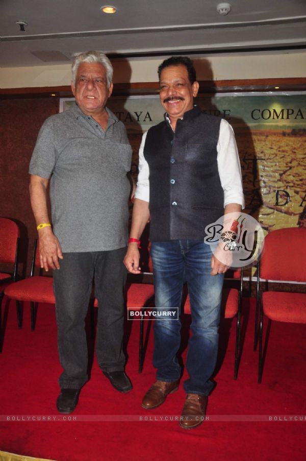 Om Puri and Govind Namdeo pose for the media at the Launch of film Project Marathwada