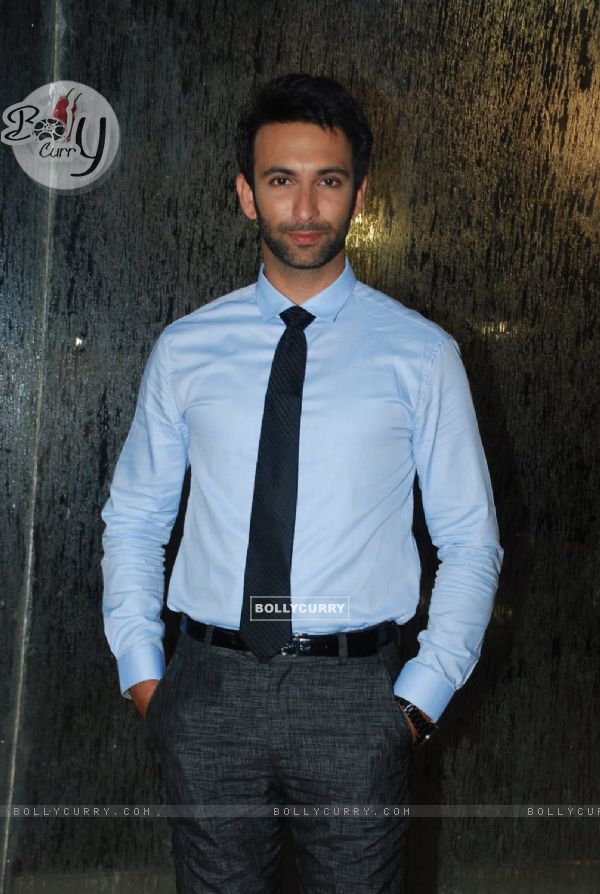 Nandish Sandhu poses for the media at Golden Achiever Awards