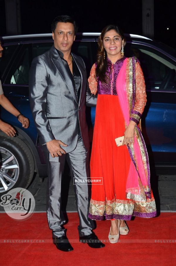 Madhur Bhandarkar poses with wife Renu at Kush Sinha's Wedding Reception