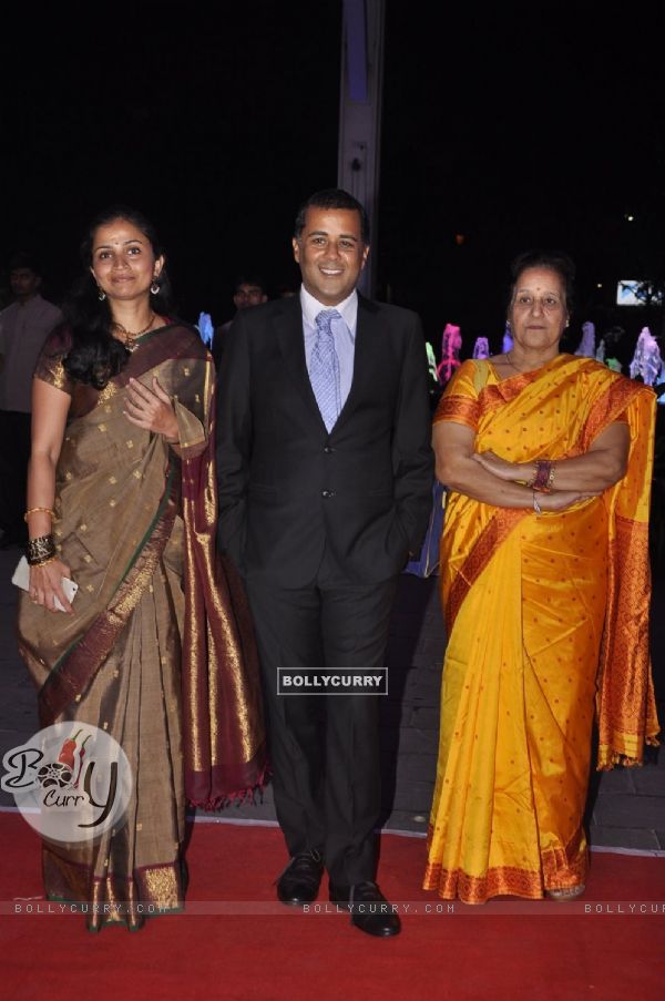 Chetan Bhagat poses with family at Kush Sinha's Wedding Reception