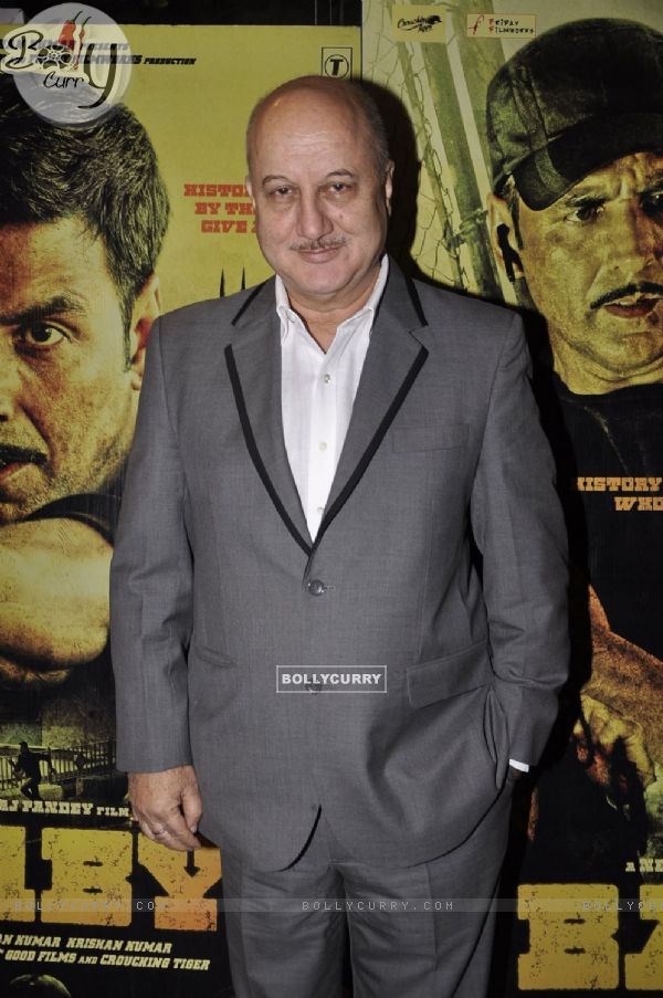 Anupam Kher poses for the media at the Special Screening of BABY for Cops