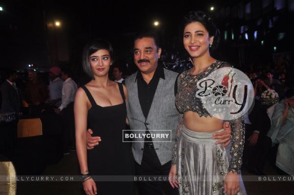 Kamal Haasan poses with daughters Shruti Haasan and Akshara Haasan at the Music Launch of Shamitabh