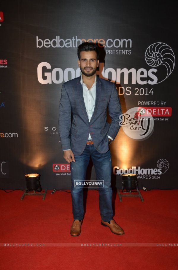 Karan Tacker poses for the media at GoodHomes Awards 2014