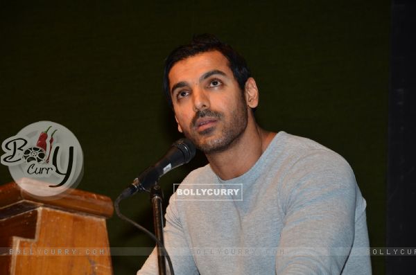 John Abraham interacts with the audience at the Launch of the Book In Search Of Dignity And Justice