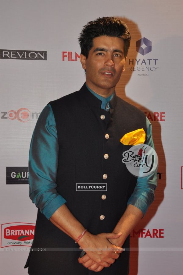 Manish Malhotra poses for the media at Filmfare Nominations Bash