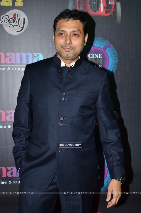 Neeraj Pandey poses for the media at the Red Carpet Premier of Baby