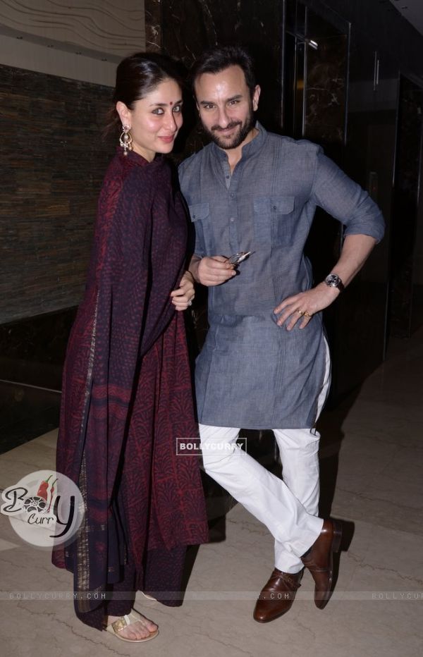 Saif Ali Khan and Kareena Kapoor pose for the media at Soha Ali Khan's Mehendi Ceremony