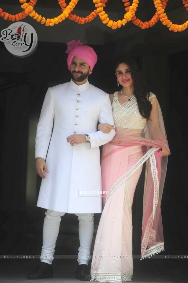 Saif Ali Khan and Kareena Kapoor pose for the media at Soha Ali Khan and Kunal Khemu's Wedding